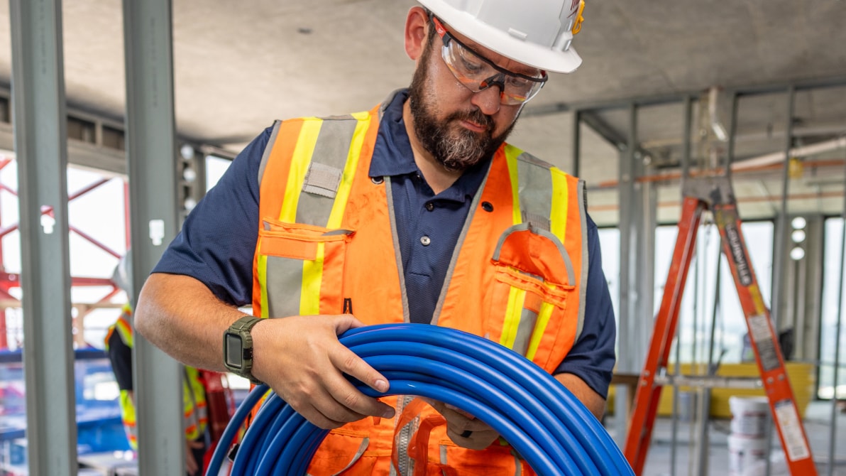 A plumber working with RWC products.