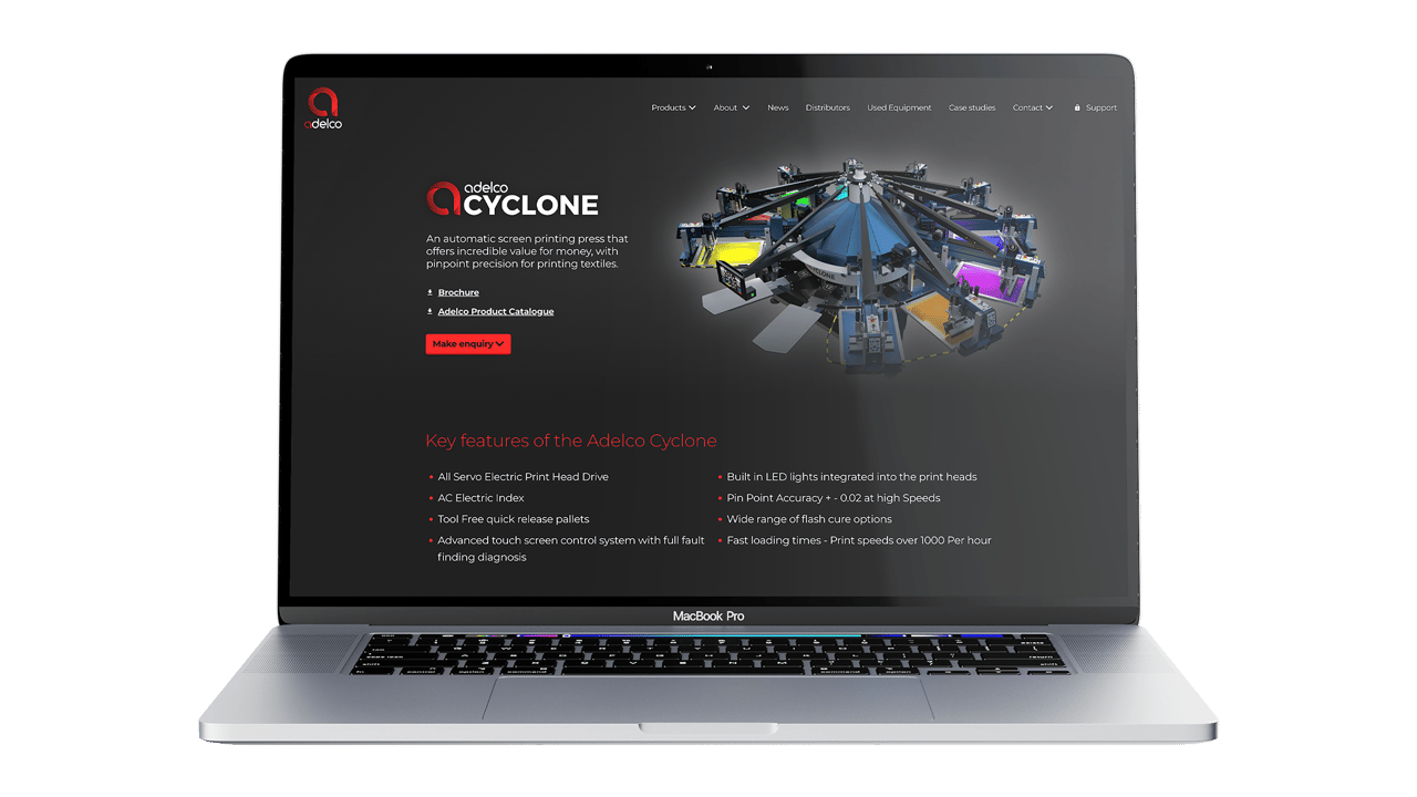 The Adelco website on a laptop.