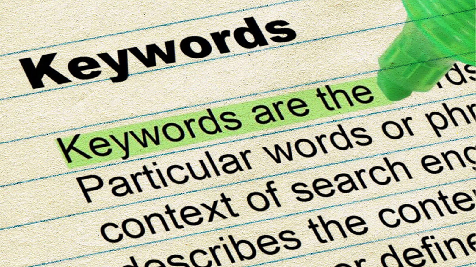 A piece of paper with the title Keywords and then some text underneath, an area of which is highlighted which reads: ‘Keywords are the’.