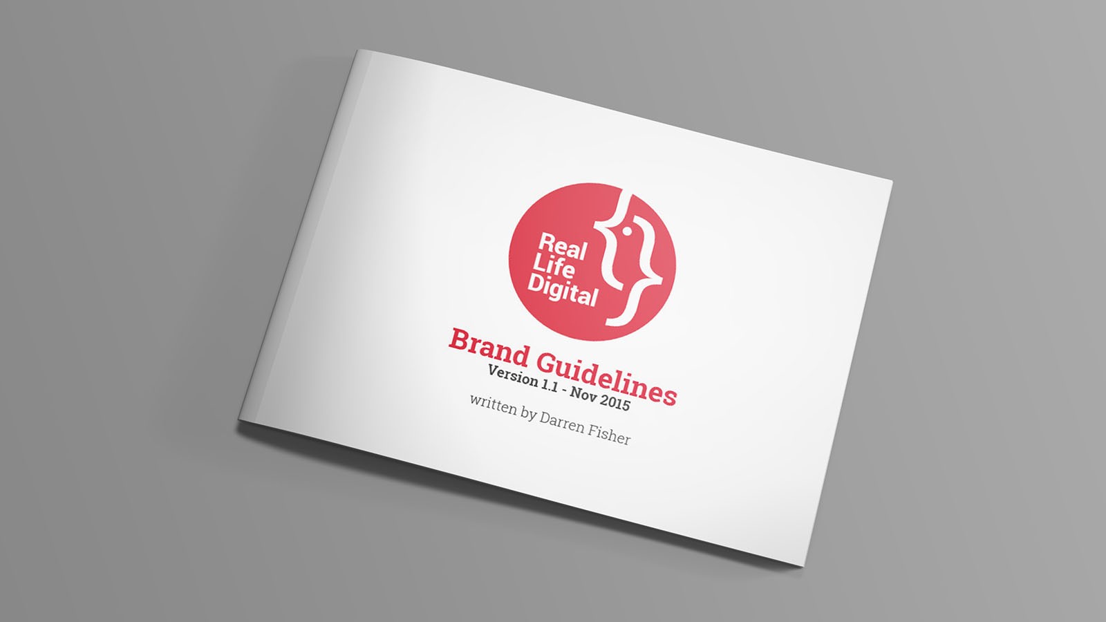 A closed copy of Real Life Digital’s branding document showing the cover.