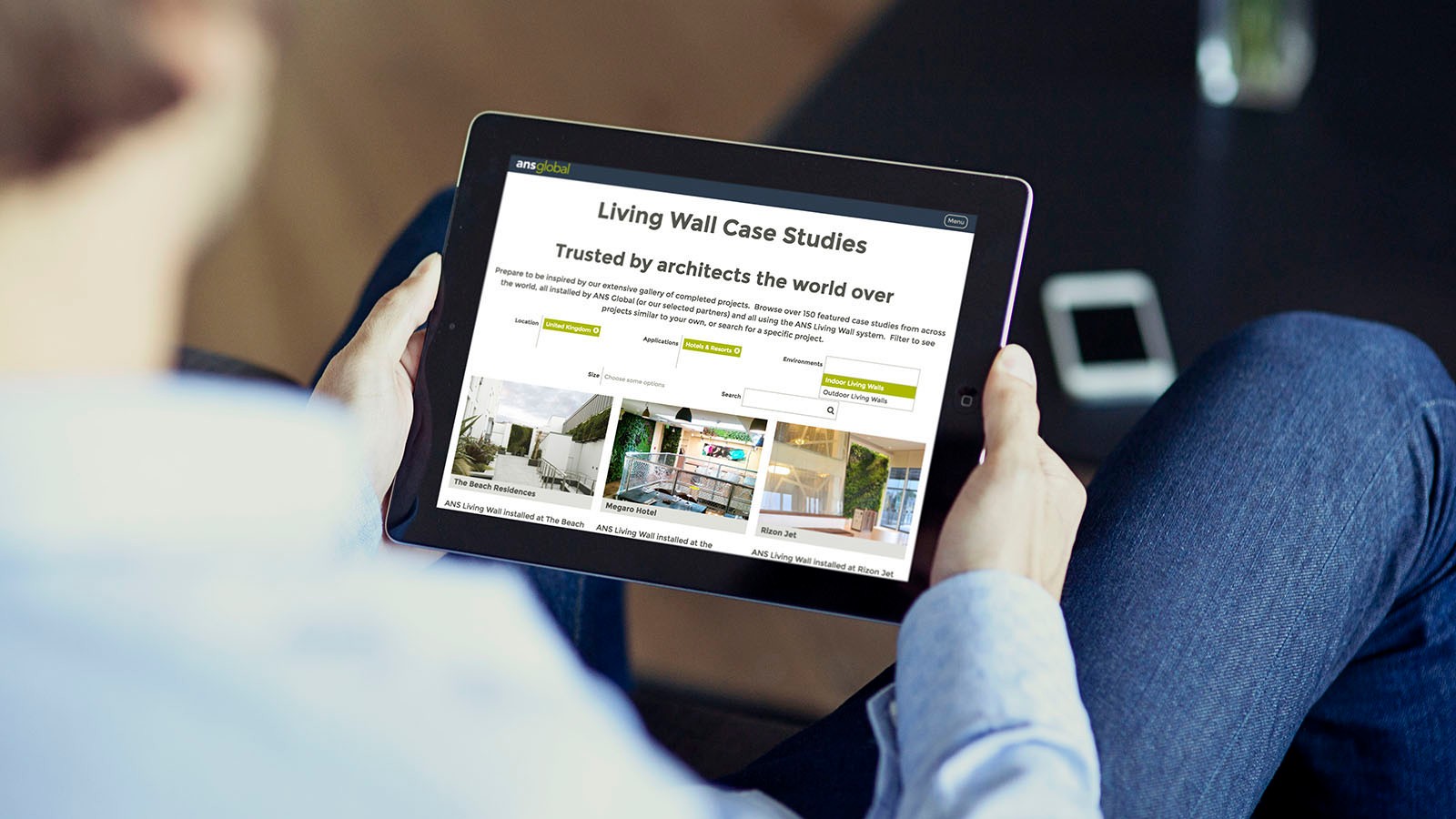 The ANS Global living wall case studies page on an iPad.