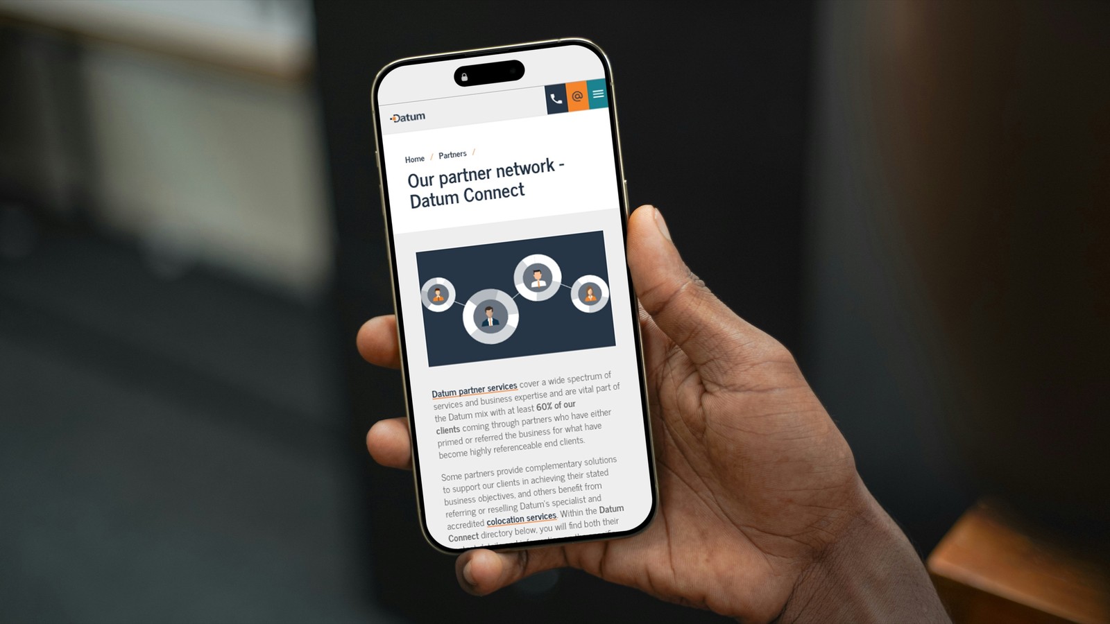 The Datum Connect partner network page shown on an iPhone held in a hand.