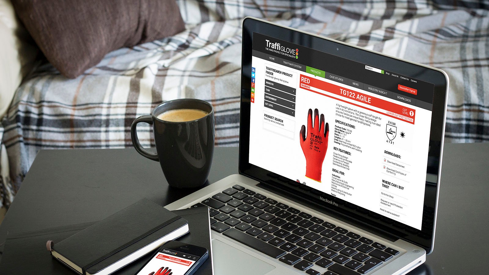 A Traffi glove product page on a MacBook.