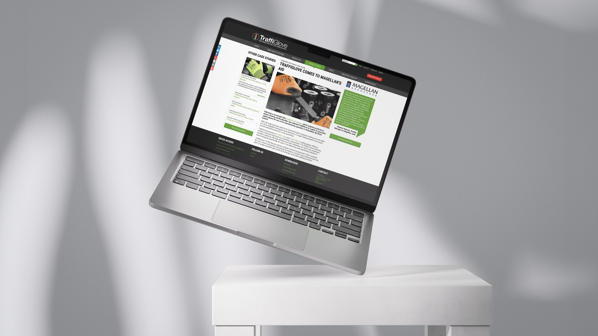A Traffi case study page shown on a MacBook tilted on the edge of a white stool.