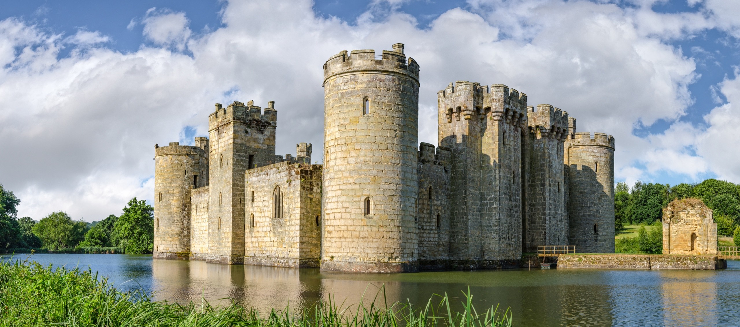 Moated castle Bodiam near Robertsbridge in East Sussex, England was built in 1385 to defend the area against French invasion during the Hundred Years' War.