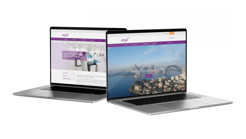 The Virtus Health corporate website shown on two laptops.
